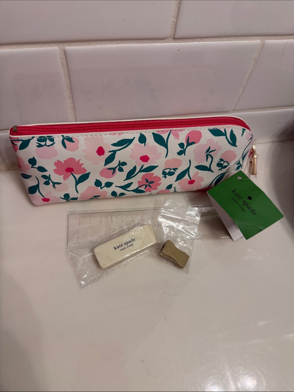 kate spade floral zip pouch in pink and teal with red zipper